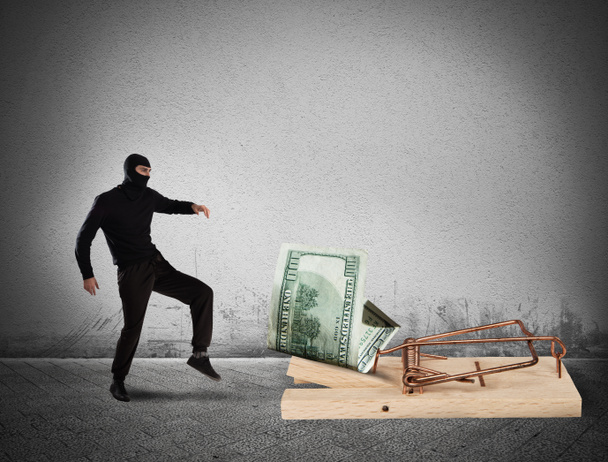 Zloděj se snaží ukrást peníze - Fotografie, Obrázek