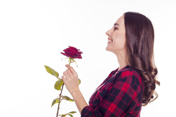 happy woman holding red flower - Valokuva, kuva