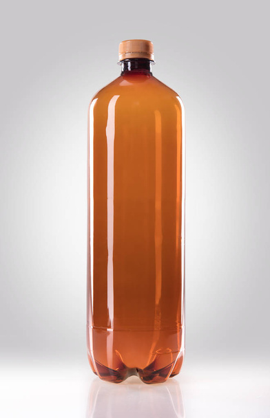 Plastic beer bottle of 2 liters with drops - Fotoğraf, Görsel
