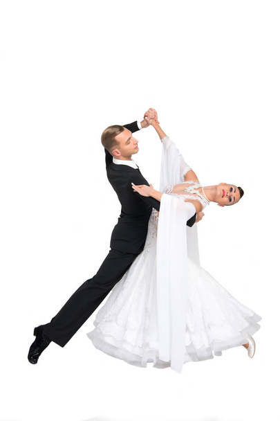 ballrom dance couple in a dance pose isolated on white bachground - Fotografie, Obrázek