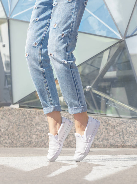 Woman posing. Summer look. White sneakers shoes - Фото, зображення
