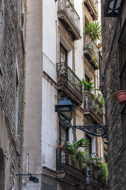 Narrow street in gothic quarter of Barcelona - 写真・画像