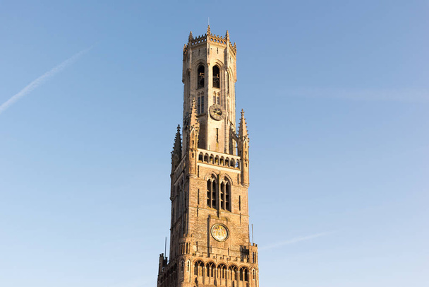 The Belfry Tower of Bruges, or Belfort is a medieval bell tower used for the protection of freedoms conceded by the Count of Flanders in the historical centre of Bruges, Belgium. - Photo, image