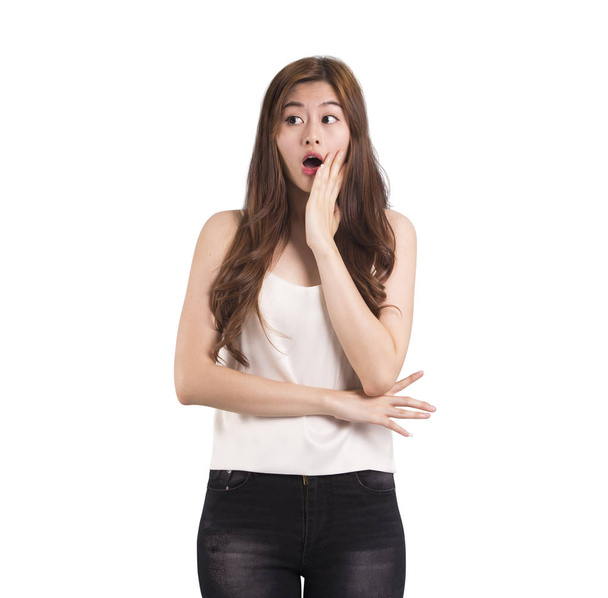 Young asian woman with surprised gesture - Photo, image