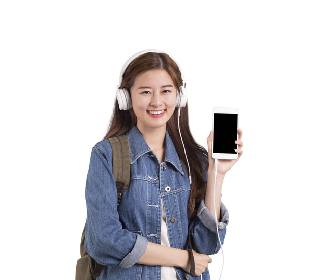 Asian woman use mobile for listening music. - Foto, Imagem