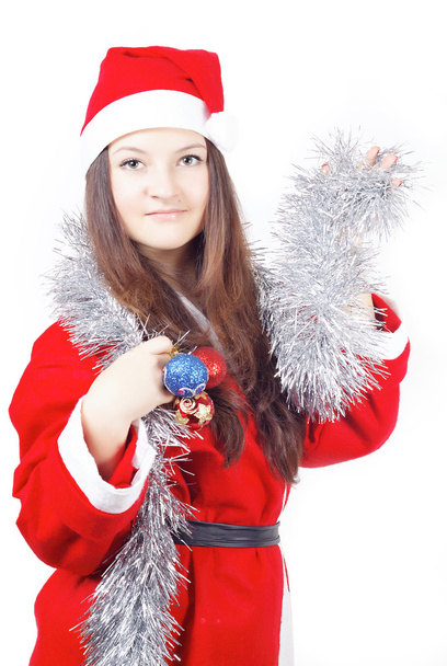Portrait of a teen girl dressed as Santa - 写真・画像