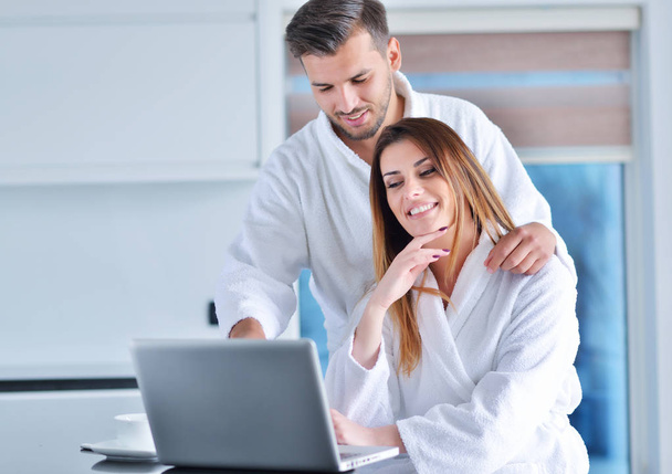 young couple in bathrobes at home  - Photo, Image
