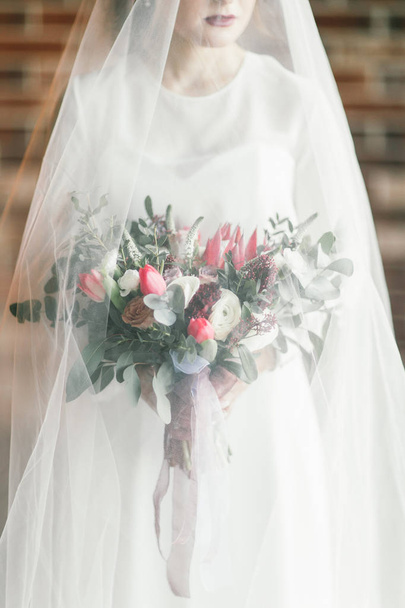 beauty bride with flowers - Fotó, kép
