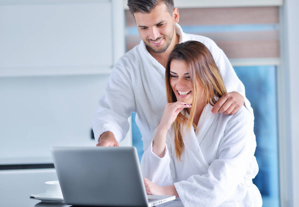 young couple in bathrobes at home  - Foto, imagen