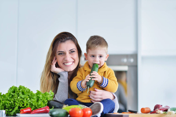 Mother and child preparing lunch  - Valokuva, kuva