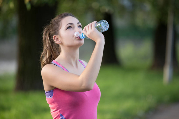 Thirsty woman drinking water - Zdjęcie, obraz