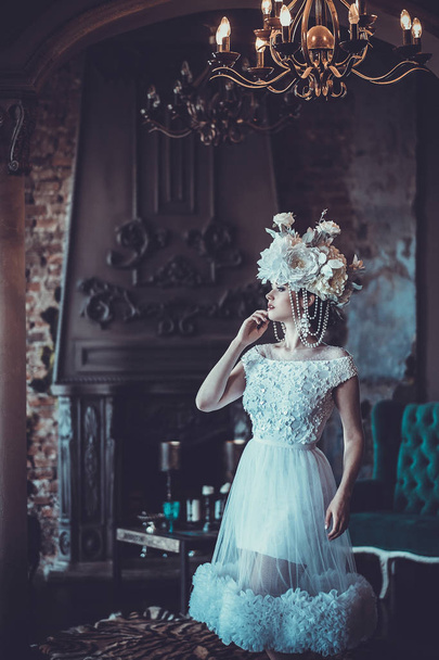 Elegant wedding dress and crown. Gorgeous woman. Tender bride in - Fotó, kép