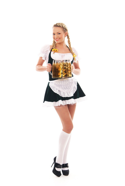 Young and beautiful bavarian girl isolated over white background - Фото, изображение