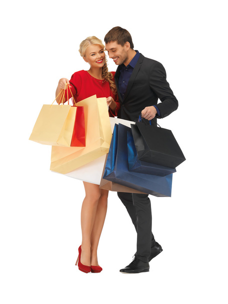 Man and woman with shopping bags - Foto, imagen