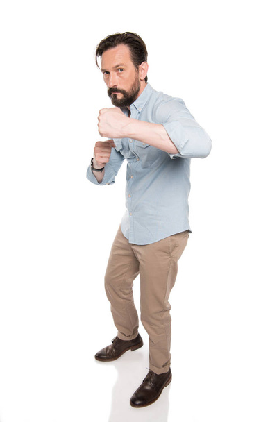 Bearded man in boxing pose  - Photo, Image