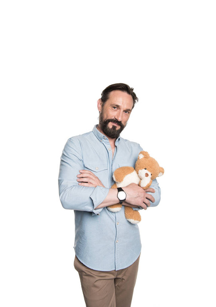 Bearded man with teddy bear  - Fotografie, Obrázek