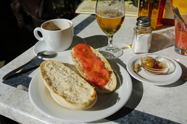 spanish lunch- coffee, beer, olives and toast with tomatos and o - Photo, Image