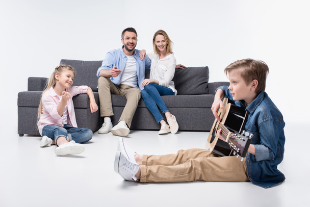 Happy family with guitar  - Valokuva, kuva