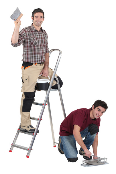 Two decorators working on site - Φωτογραφία, εικόνα
