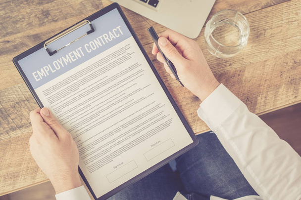EMPLOYMENT CONTRACT CONCEPT  - Photo, image