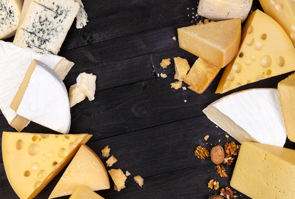 Various types of cheese. Top view. Copy space. - Foto, afbeelding