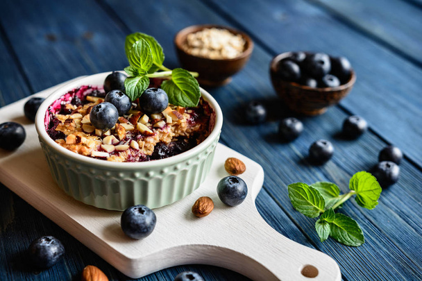 Blueberry crumble with oat flakes and almonds - Photo, Image