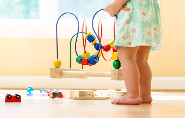Toddler girl playing with toys - 写真・画像