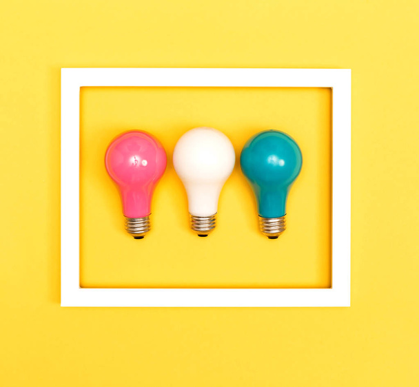 Three Colored light bulbs - Foto, Imagen