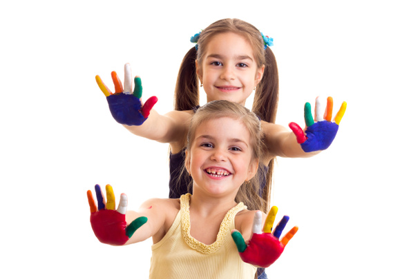 Niñas con manos de colores
 - Foto, Imagen