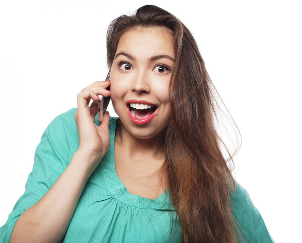 Portrait of young woman on phone call - Photo, image