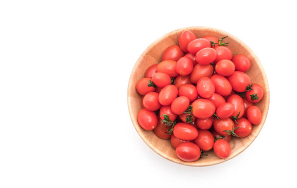 fresh tomatoes in wood bowl - Foto, Bild