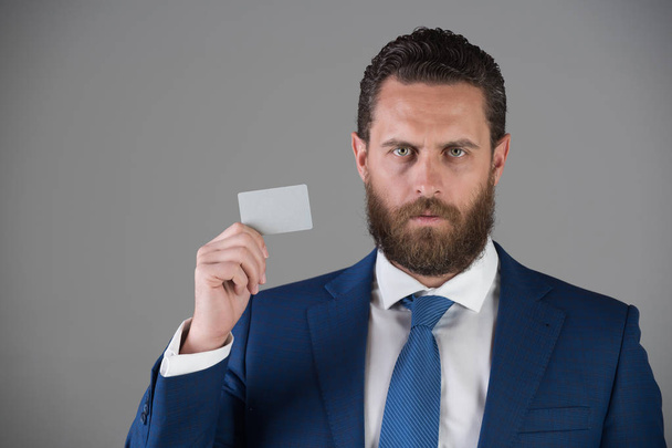 confident businessman with silver business or credit card, business ethics - Foto, immagini