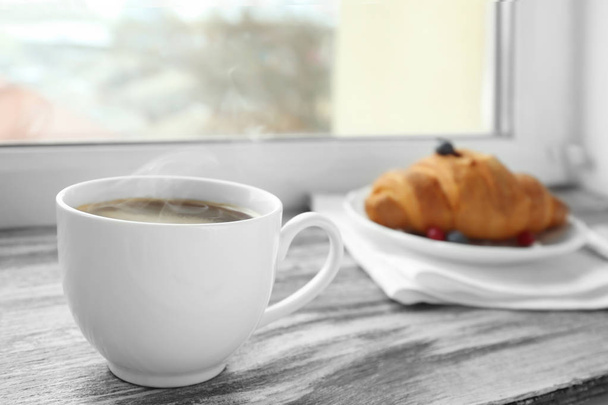 Cup of coffee and croissant  - Fotoğraf, Görsel
