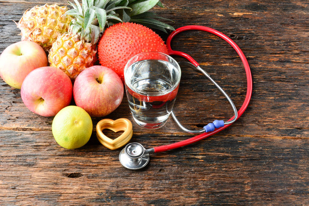 Fruit, heart, stethoscope and water glass for healthy and body s - Photo, Image