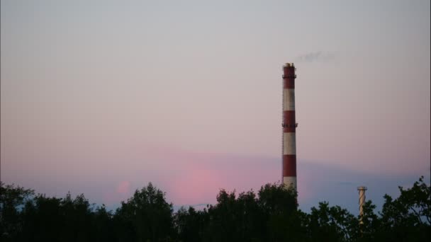 Sunset Time Lapse Sky and moving clouds Power Plant pipe with smoke Latvia 4K - Footage, Video