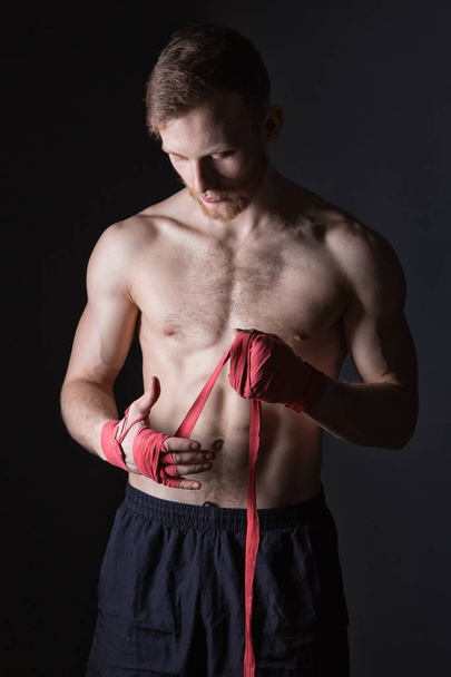 Fighter bearded man and boxing bandages - Fotografie, Obrázek