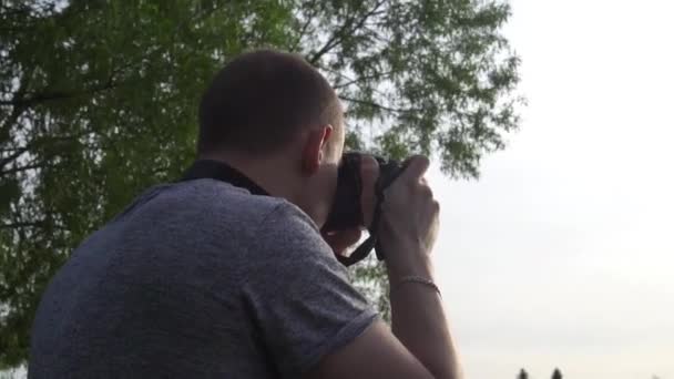 the operator takes photos of nature on camera - Footage, Video