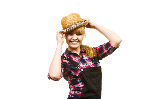 Woman wearing sun hat posing and smiling - Foto, Imagen