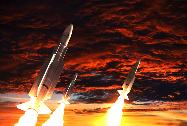 Trois fusées décollent sur le fond du ciel apocalyptique
 - Photo, image