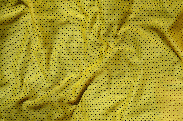 Yellow sport clothing fabric texture background - Photo, Image