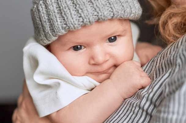 Woman holding baby, close up. - Photo, Image