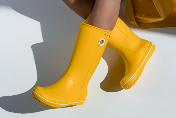 woman in yellow rubber boots  - 写真・画像