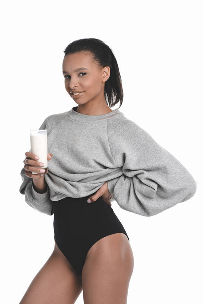 Young woman drinking milk  - 写真・画像