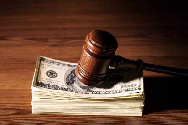 wooden gavel on  table and money - Foto, Bild