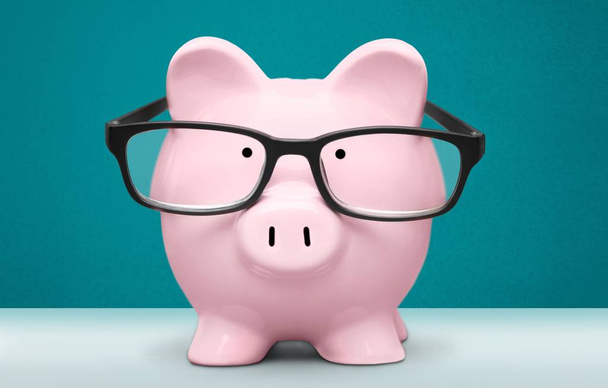  piggy bank in glasses - Foto, Bild