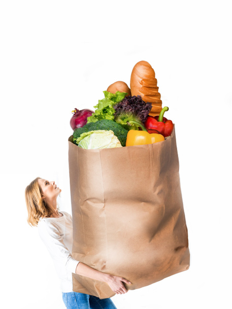 mujer con bolsa de papel enorme
 - Foto, Imagen