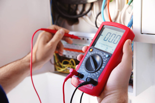 electrician measuring voltage - Photo, Image