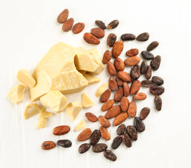 Composition with cocoa butter and beans  - Foto, Imagen