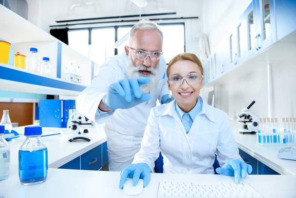 Scientists working in lab  - Фото, зображення