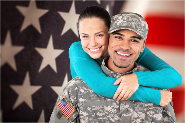 Smiling soldier with his wife  - Foto, Imagen